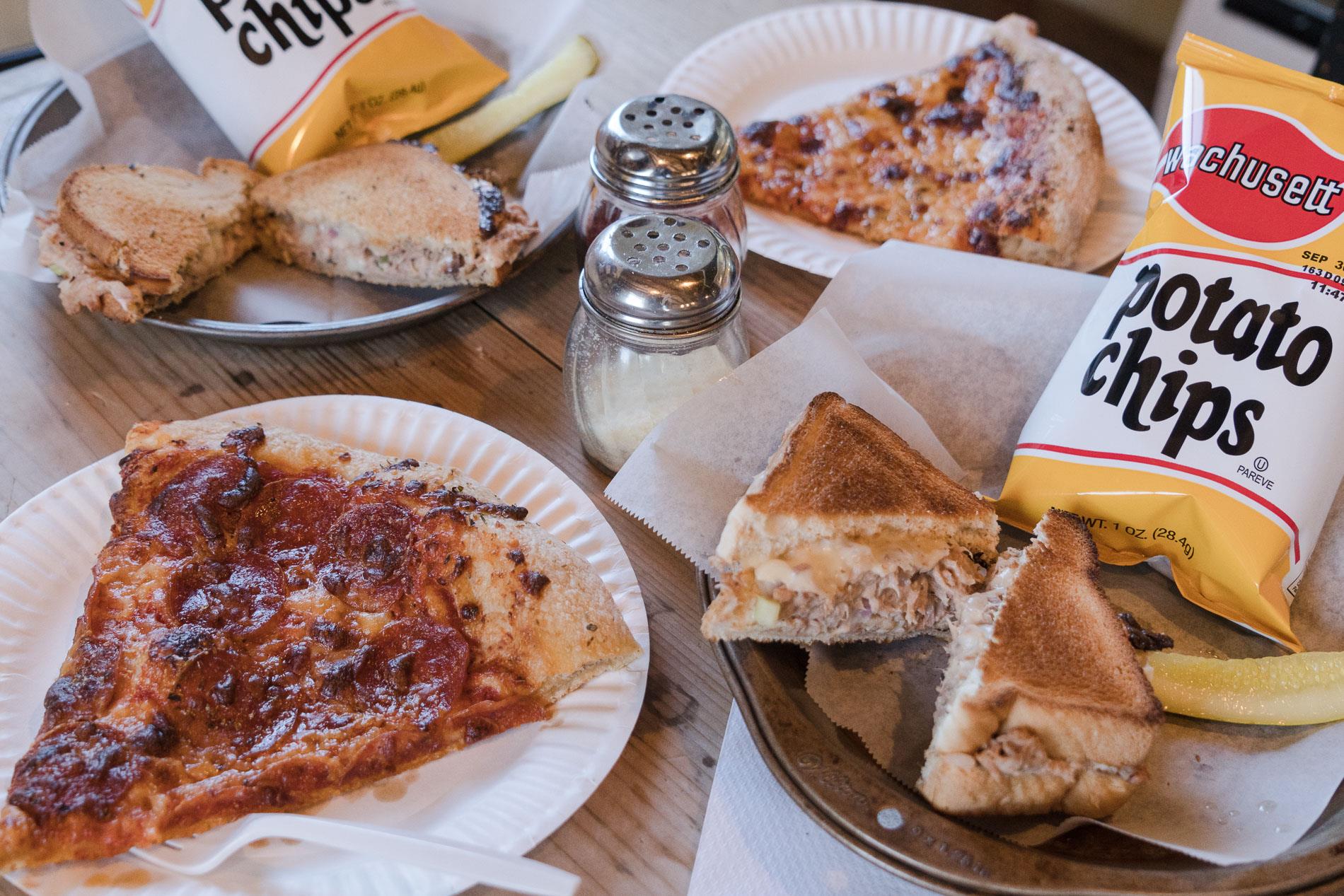 pizza-sandwiches-and-snacks-on-table.jpg